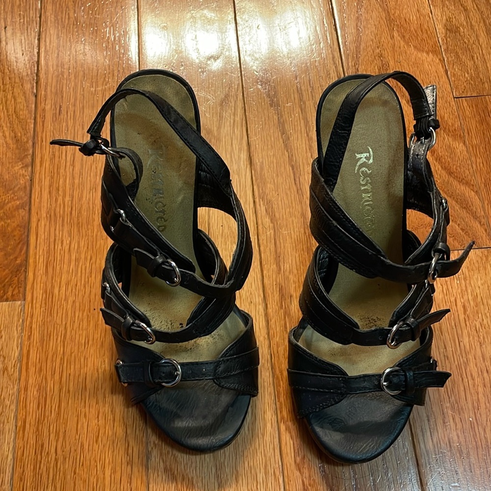 Edgy black shoes with buckles. Good condition.